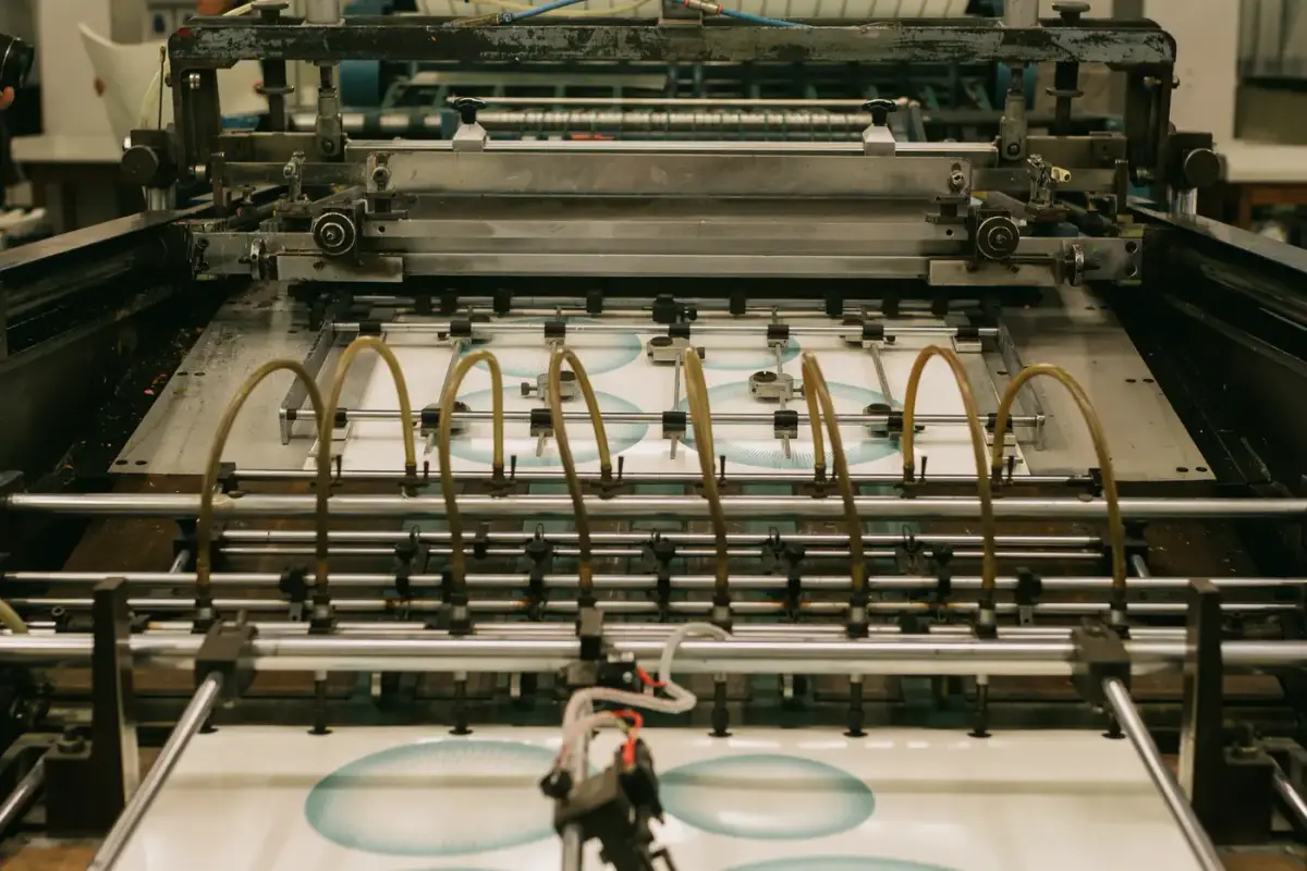 An industrial printing press running a job