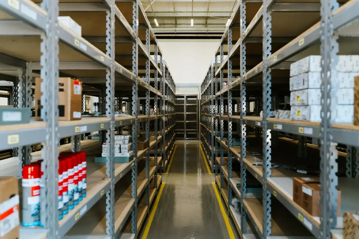 Rows of stocked warehouse shelving