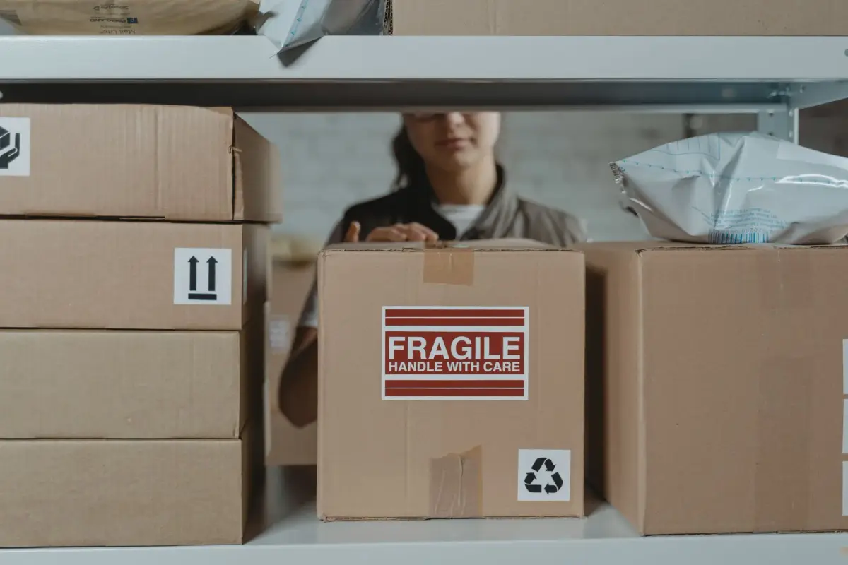 Branded orders packed into shipping boxes for fulfillment