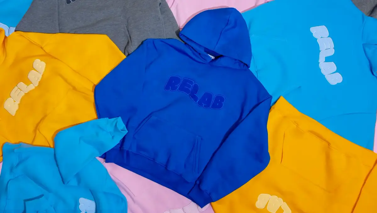 A collection of branded hoodies in bright colors